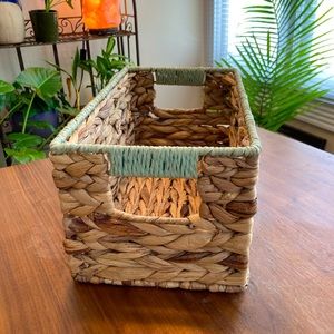 Wicker storage box with light blue trim